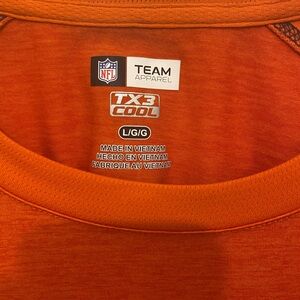 NFL Men’s Orange TX3 Cool Team Apparel Short Sleeve Shirt
